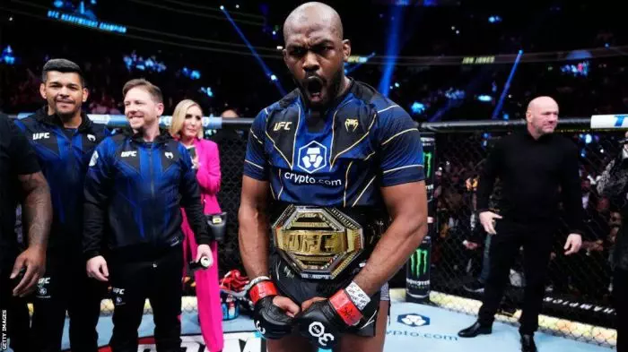 UFC Champ Jon Jones Retains Heavyweight Title And Gives Title Belt To ... Jon Jones was stripped of UFC belt after knocking out bitter rival in career-best win wiped from his record