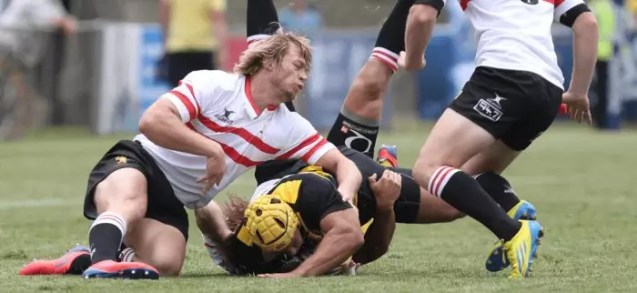 Why do rugby players wear long socks?