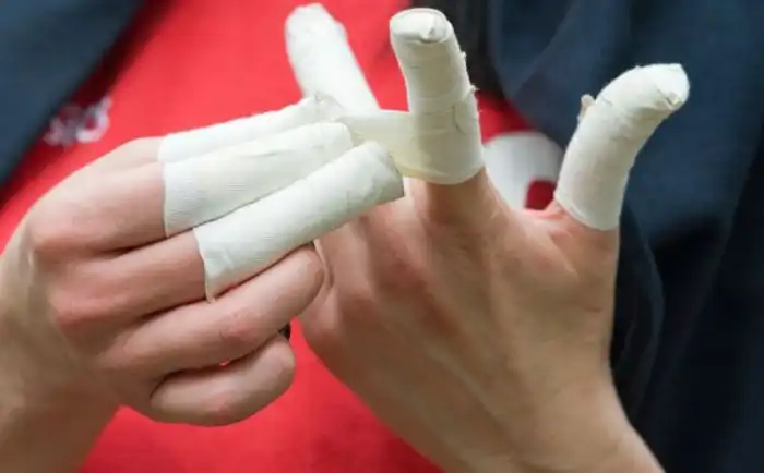 Why do rugby players tape their legs?