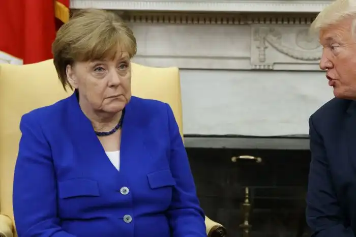 Photos of Ivanka Trump and German Chancellor Angela Merkel widely ...