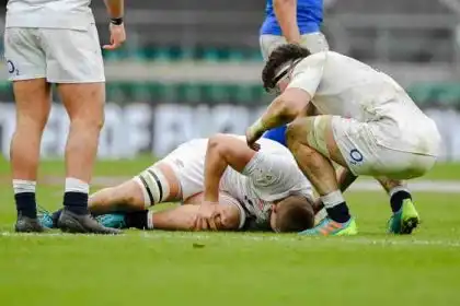Why don't rugby players wear helmets?