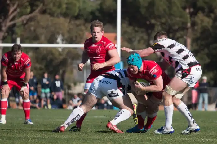 Why don't they wear helmets in rugby?